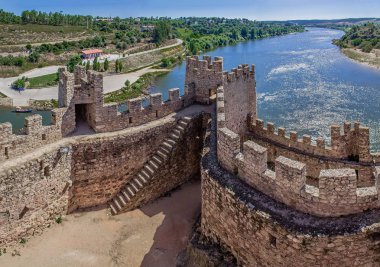Almourol, Portugal - July 18, 2017: Castle of Almourol, an iconic Knights Templar fortress built on a rocky island in the middle of Tagus river. Almourol, Portugal clipart
