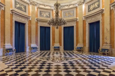Lisbon, Portugal - June 10, 2013: Ambassador Hall of the Noble Floor in Ajuda National Palace or Palacio Nacional da Ajuda with checkered freemason floor. 19th century neoclassical Royal palace. clipart