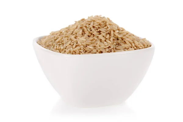 stock image Brown rice in a bowl isolated on a white background