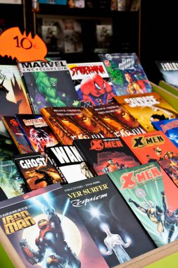 Lisbon, Portugal - May 30, 2013: Comic Books of several Marvel Super-Heroes, in the Lisbon Book Fair organized at Eduardo VII Park. clipart