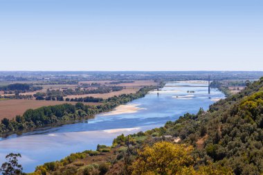 The Tagus River (Rio Tejo), the largest of the Iberian Peninsula, and the Leziria landscape seen from Portas do Sol belvedere. Santarem, Portugal. clipart