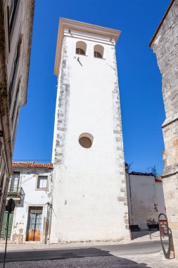 Cabacas Tower, a very tall medieval watchtower and remnant of the former castle. Today is used as the Museum of Time. Santarem, Portugal. clipart
