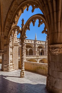 Lisbon, Portugal. Cloister of the Jeronimos Monastery or Abbey aka Santa Maria de Belem monastery. UNESCO World Heritage. Manuelino or Manueline  clipart