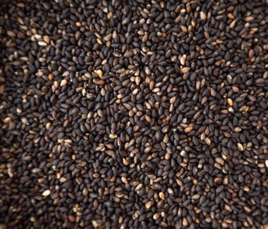 Siyah kızarmış susam tohumlarının arkaplanı 