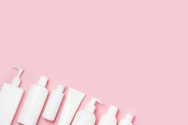 Bílé Kosmetické Sklenice Růžovém Pozadí Kosmetika Pro Péči Pleť — Stock fotografie
