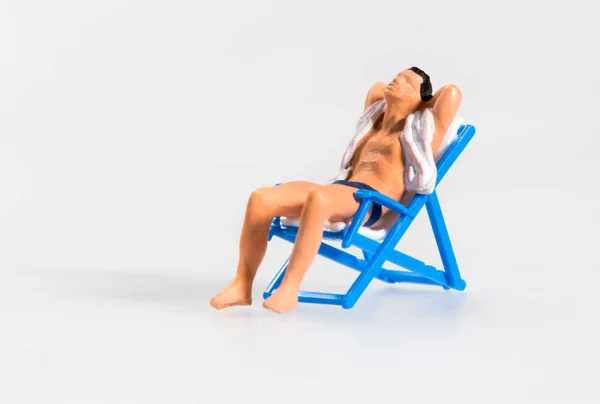 Miniature Man Shirt Swimming Trunks Relaxing Sunbathing Folding Blue Deckchair — Stock Photo, Image