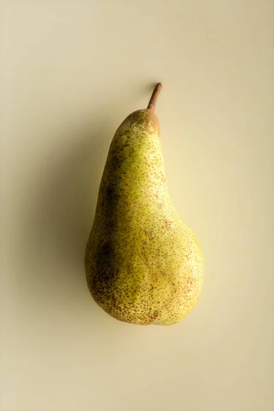 Whole Ripe Pear Isolated Beige Background Viewed Its Side — Stock Photo, Image