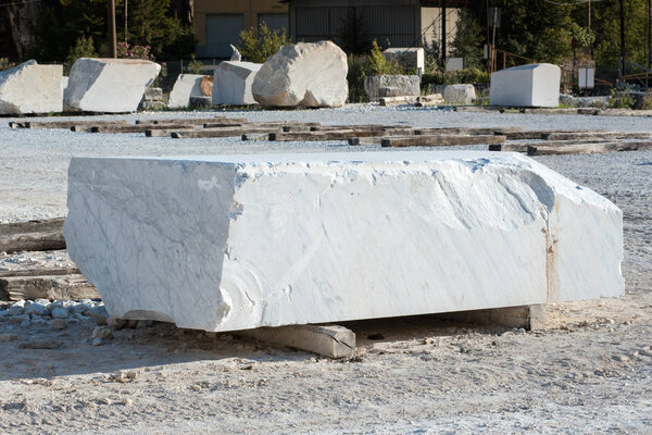 Large rectangular block of white Carrara marble