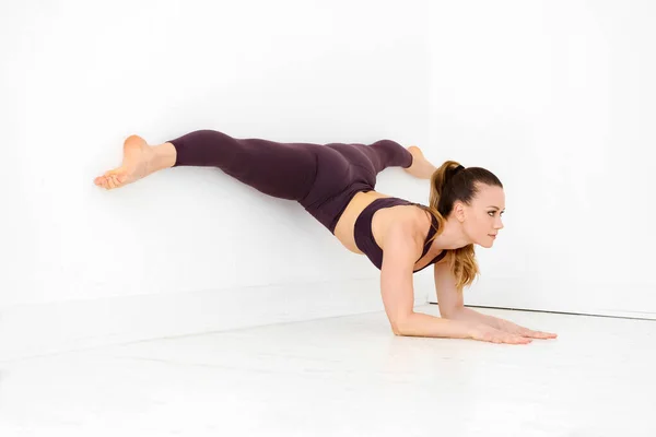 Woman Athlete Doing Elbow Wall Split Yoga Pose Corner High — Stock Photo, Image