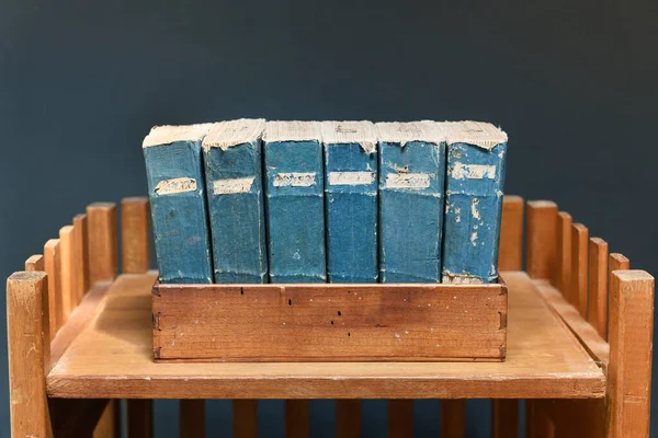 Set Old Worn Tattered Vintage Books Blue Spines Labels Wooden — Stock Photo, Image