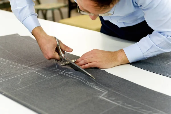 Tailor Carefully Cutting Grey Fabric Workshop Using Large Shears Follow — Stock Photo, Image