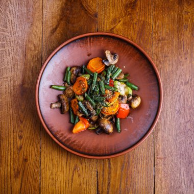 Stewed vegetables in the restaurant. Delicious salad.
