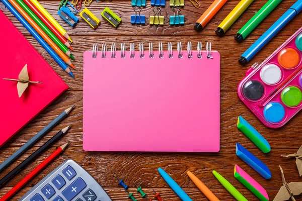 The school stationery and paper origami are laid out around the place for the text — Stock Photo, Image