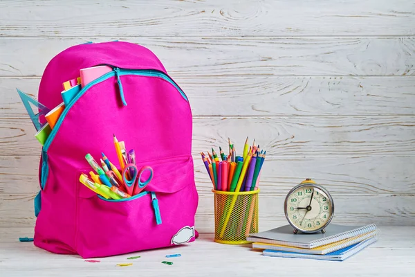 Bright briefcase of the stationery on a white background — Stock Photo, Image