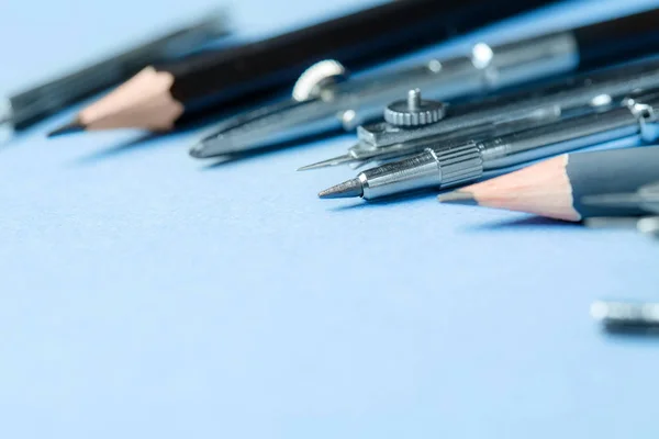 Drawing tools are arranged on a blue background — Stock Photo, Image