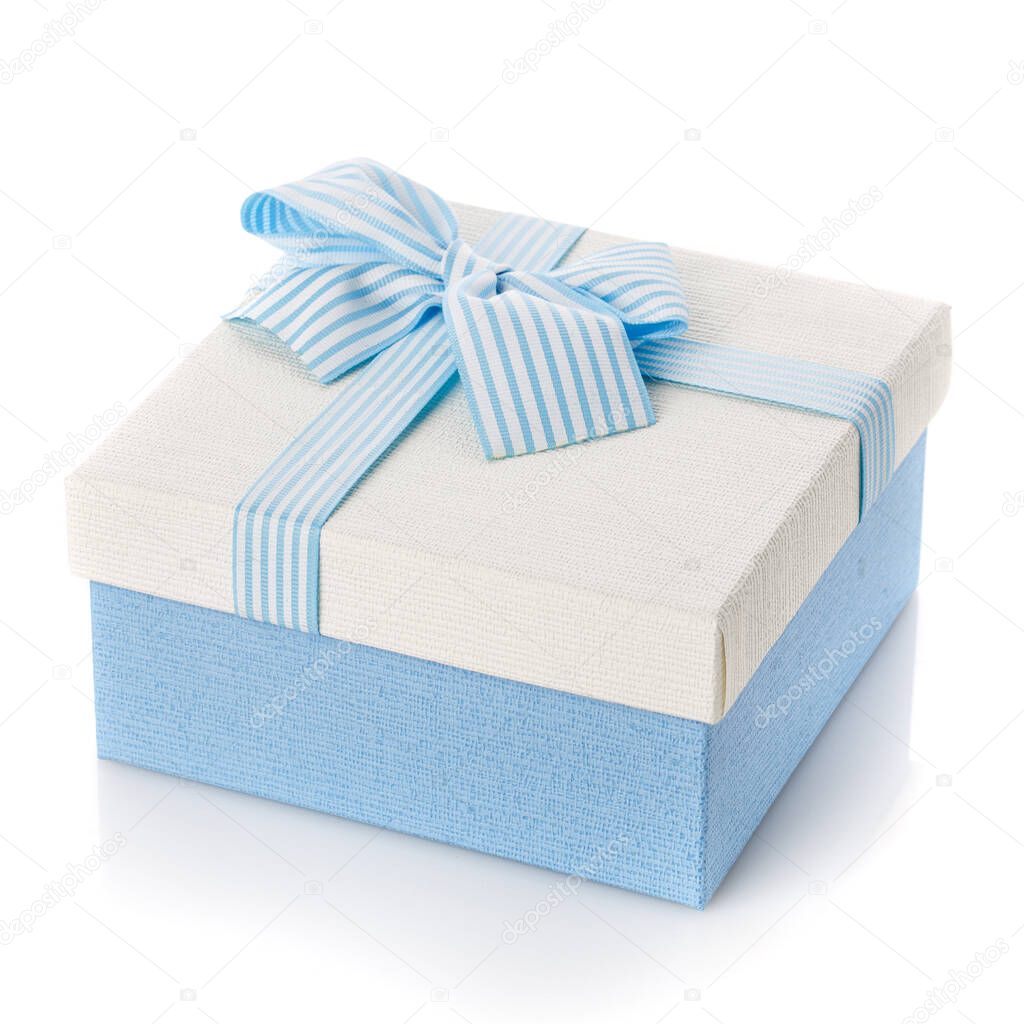 Blue gift box with ribbon and bow on white background.