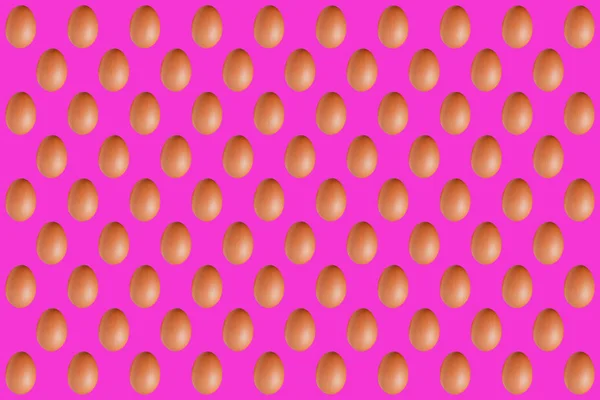 Eggs on pink background texture illusion close-up — Stock Photo, Image