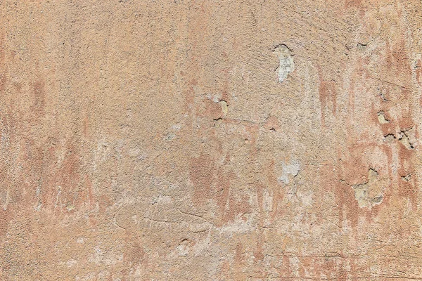Textúra egy régi barna fal kopott stukkó és karcos feliratok — Stock Fotó