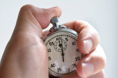 Spor, ölçümleri, Metroloji izole bir el presleri bir close-up düğmesi kronometre Başlat