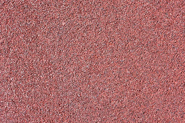 Texture sports coverage of the stadium\'s athletics field, close-up