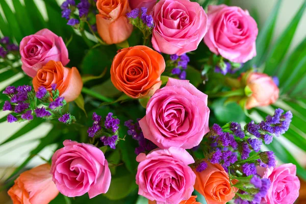 A large bouquet of colored roses, top view