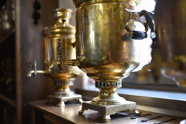 Old Russian samovar stands at the window