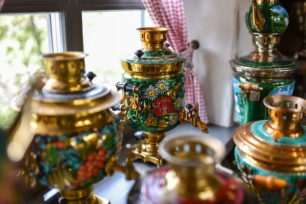 Old Russian samovar stands at the window