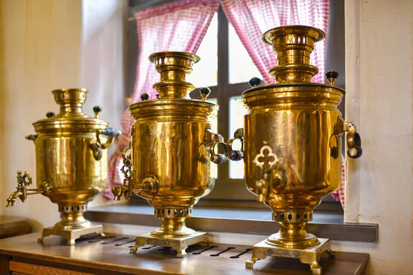 Old Russian samovar stands at the window