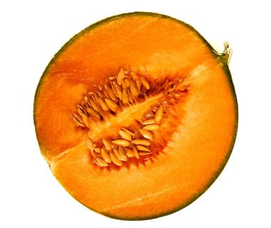    Sarı kavun mutfak masasında yatıyor.                            