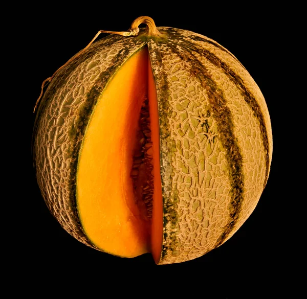 yellow melon lies on the kitchen table