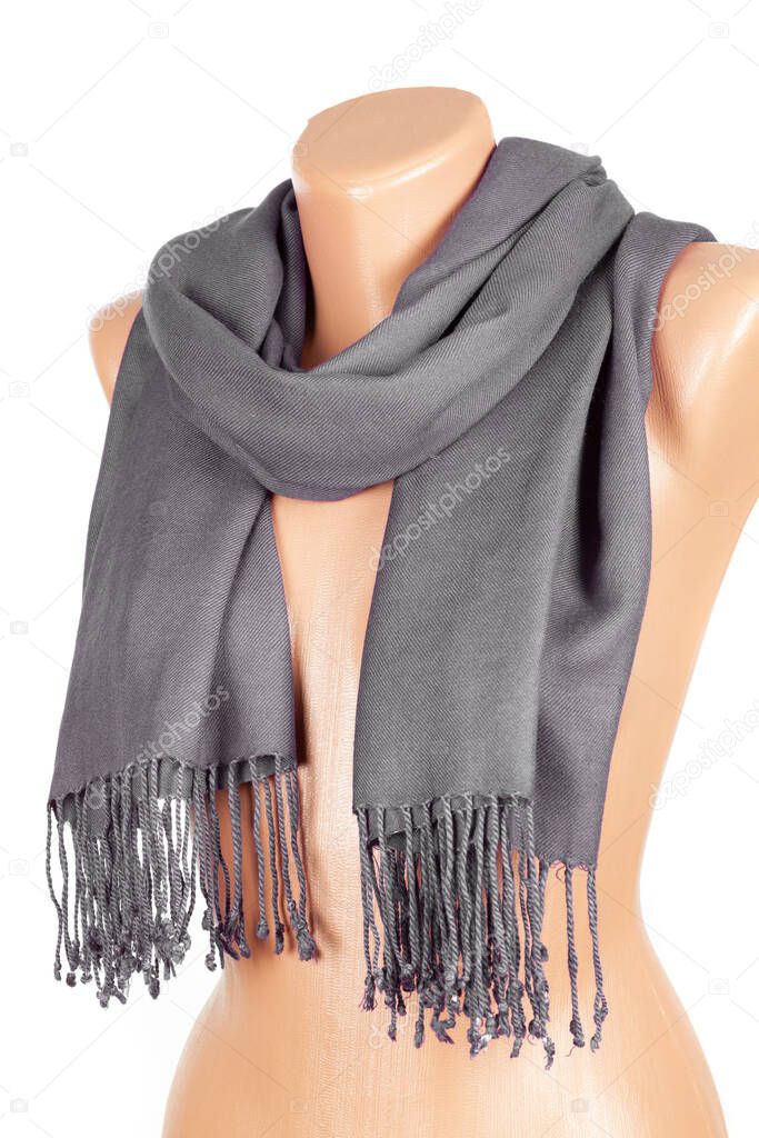 Gray scarf on mannequin isolated on white background. Female accessory.