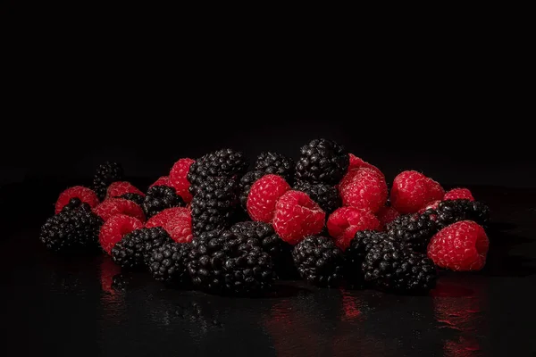 Fresh berries on a black background — Stock Photo, Image
