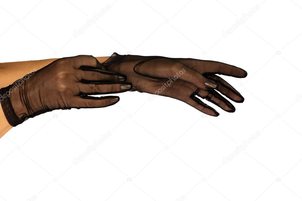 Female hands with a manicure in thin black short tender guipure gloves on a white background isolated in studio 