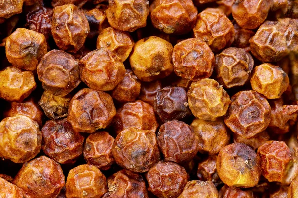 Kamboçya 'dan gelen süper makro kurutulmuş kırmızı kamış biberi çok yakından çekilmiş. yiyecek arka planı.