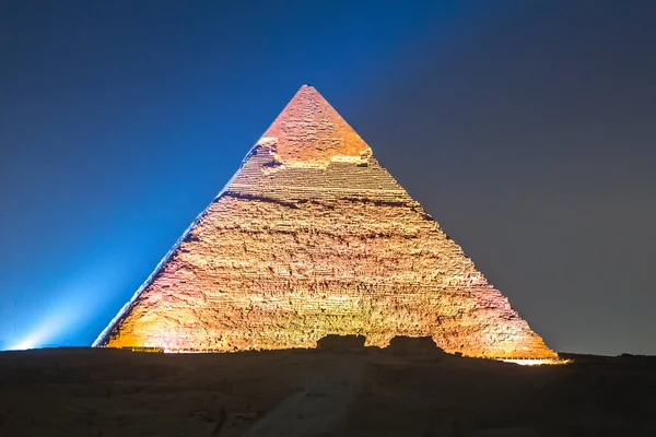 Great Pyramid of Giza illuminated at night, UNESCO World Heritage site, Cairo, Egypt.