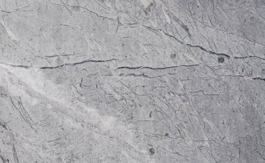 Çizikler ve çatlaklar ile taş doku parçası. Doğal arka plan.