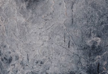 Çizikler ve çatlaklar ile taş arka plan. Doğal doku.