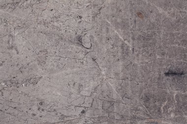 Çizikler ve çatlaklar ile taş arka plan. Doğal doku.