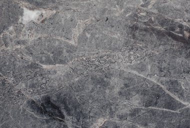 Çizikler ve çatlaklar ile taş doku parçası. Doğal arka plan.