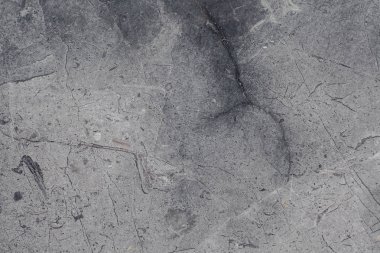Çizikler ve çatlaklar ile taş doku parçası. Doğal arka plan.