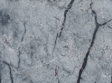 Çizikler ve çatlaklar ile taş arka plan. Doğal doku.