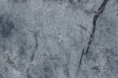 Çizikler ve çatlaklar ile taş doku parçası. Doğal arka plan.