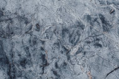 Çizikler ve çatlaklar ile taş doku parçası. Doğal arka plan.