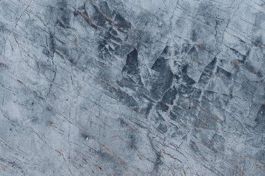 Çizikler ve çatlaklar ile taş doku parçası. Doğal arka plan.