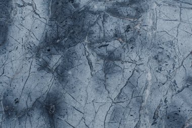 Çizikler ve çatlaklar ile taş doku parçası. Doğal arka plan.