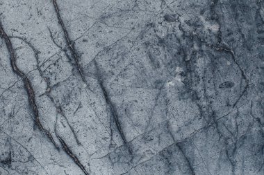 Çizikler ve çatlaklar ile taş doku parçası. Doğal arka plan.