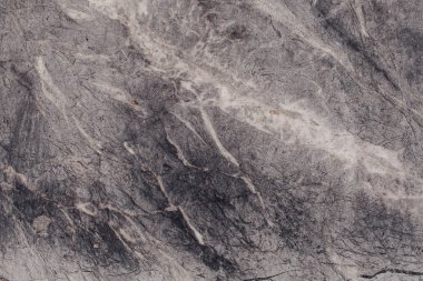 Çizikler ve çatlaklar ile taş doku parçası. Doğal arka plan.