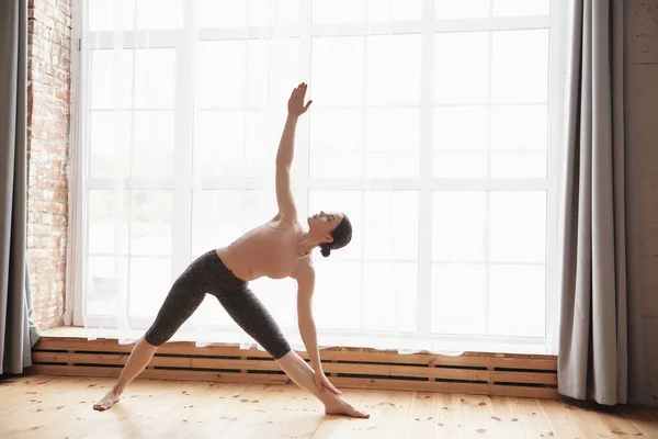 Young Woman Practice Yoga Stretching Bending Side Exercise Looking Full — Stock Photo, Image