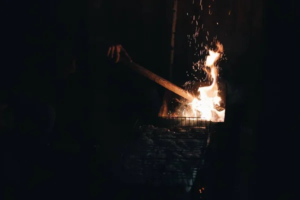 Burning logs in blazed flames of the fireplace. — Stock Photo, Image