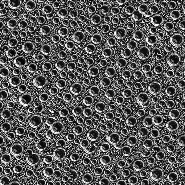 Burbujas de aire en bucle sin costura sobre fondo negro —  Fotos de Stock